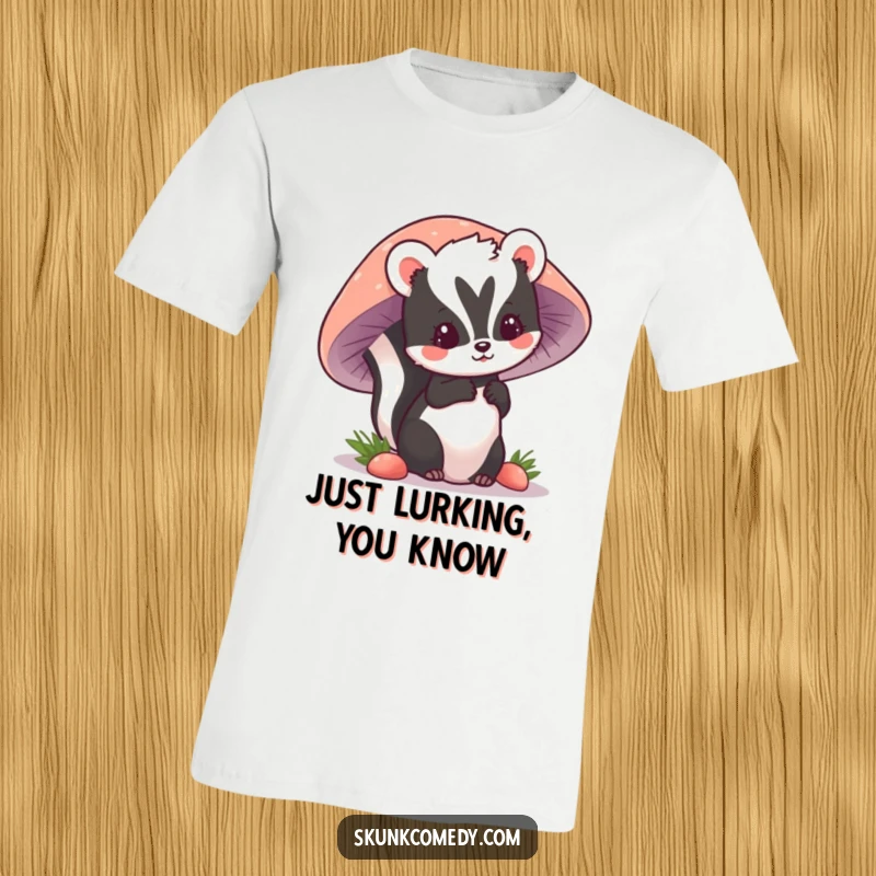 Funny kawaii skunk peeking from behind a big mushroom, a joyful and curious expression on this hilarious t-shirt.