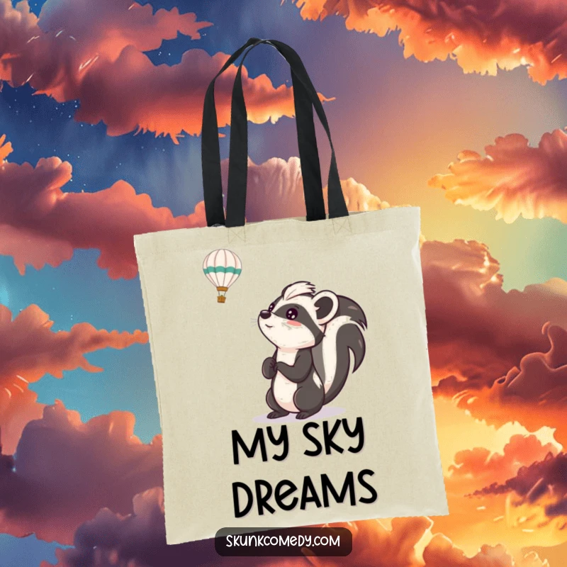 Funny skunk tote bag illustrating a skunk looking up with excitement at a hot air balloon, a perfect accessory for dreamers.